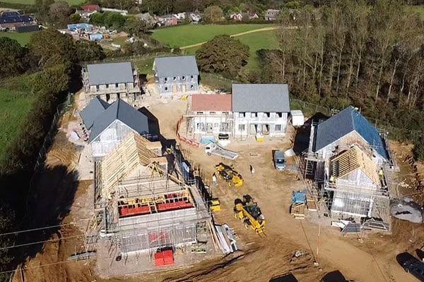 Aerial view of the Branstone Farm development showing affordable timber frame housing under construction.